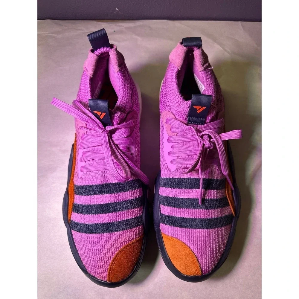 Adidas brand sports sneakers excellent condition purple color with navy blueo